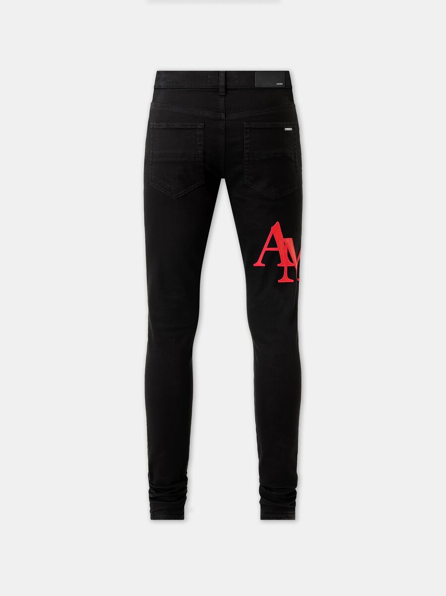 SKINNY JEANS MED FÖRSKJUTET LOGO – Svart Röd